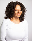 Coils to Locs shoulder length Cleo wig in dark brown with soft perm rod curls, front view.
