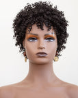 Coils to Locs Jasmine wig in black on mannequin with ethnic earrings, front view.