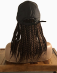 Coils to Locs 12" braided Kimmie Cap in brown showcased on mannequin, back view.