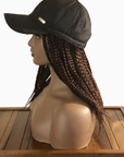 Coils to Locs 12" braided Kimmie Cap in brown showcased on mannequin.