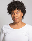 black woman wearing coils to locs jasmine wig black