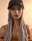 Coils to Locs 18" braided Kimmie Cap in gray on a manneqin head.