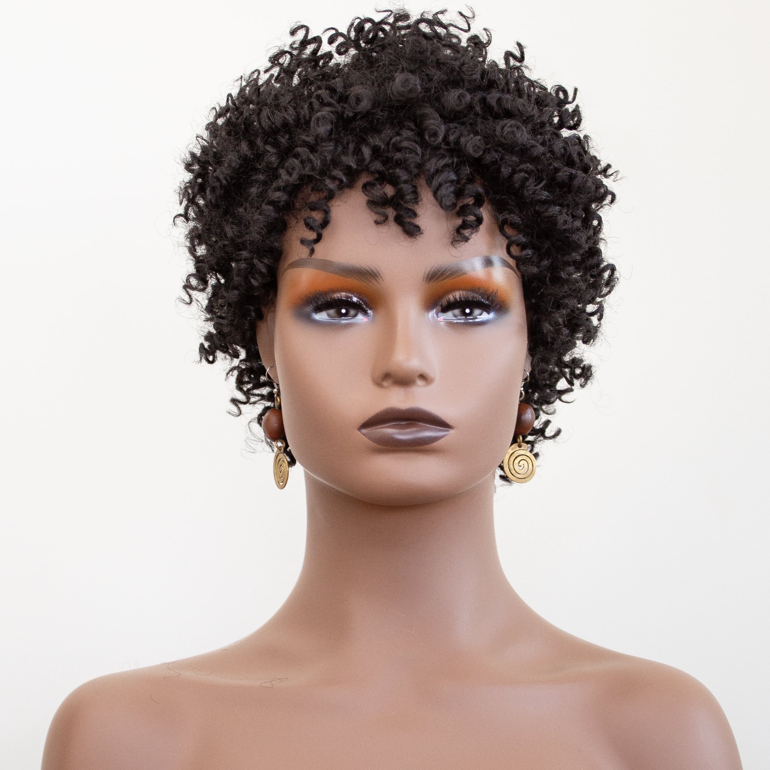 Coils to Locs Jasmine wig in black on mannequin with ethnic earrings, front view.