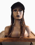 Coils to Locs Kimmie Cap braids in black copper ombre on mannequin head, front view.